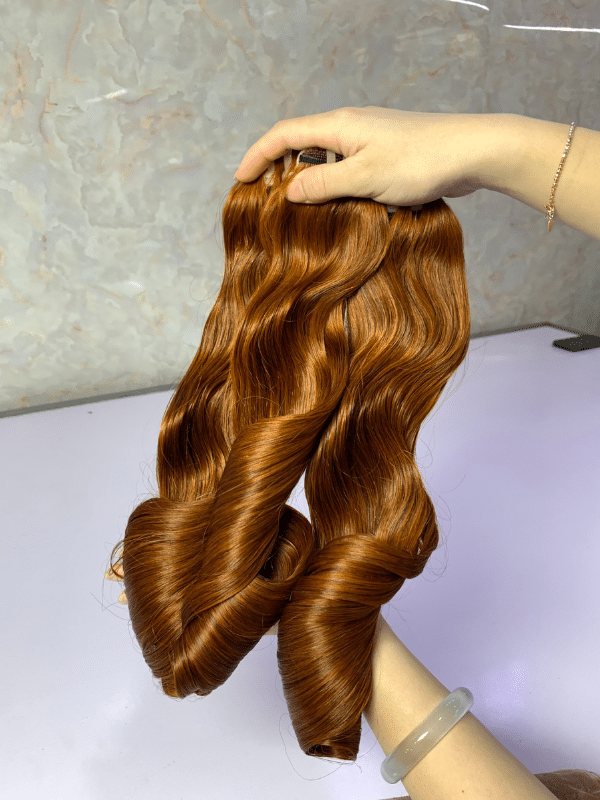 chestnut color bouncy curly vietnamese hair