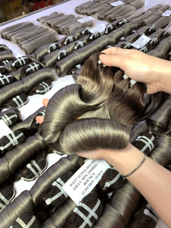 Grey color bouncy curly vietnamese weft hair bundle